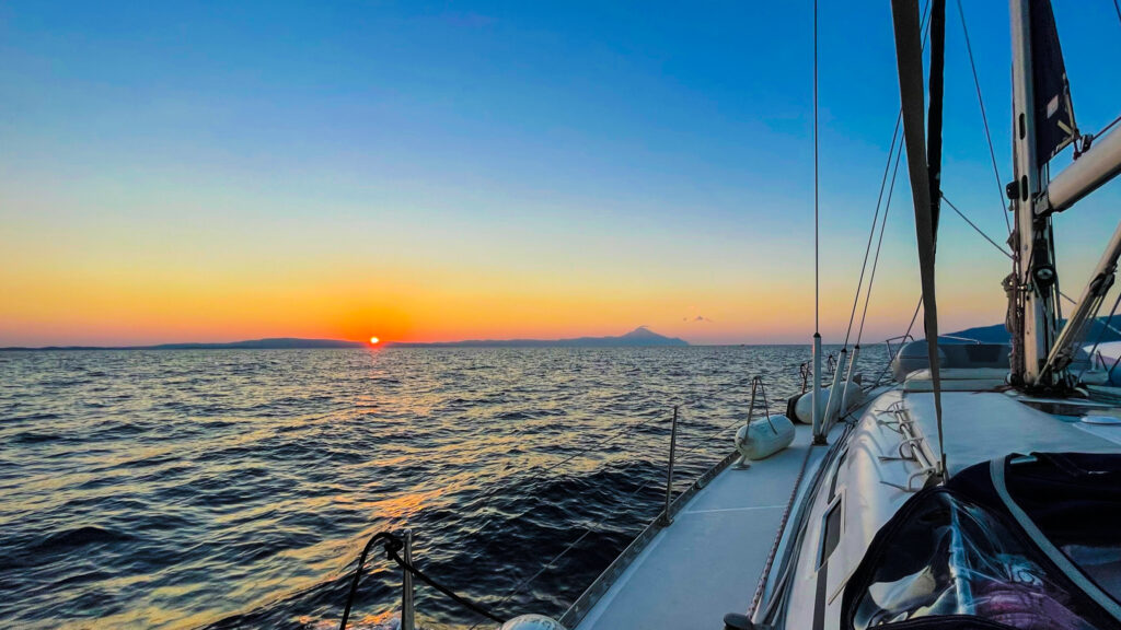 Cruising into the sunrise over Mount Athos